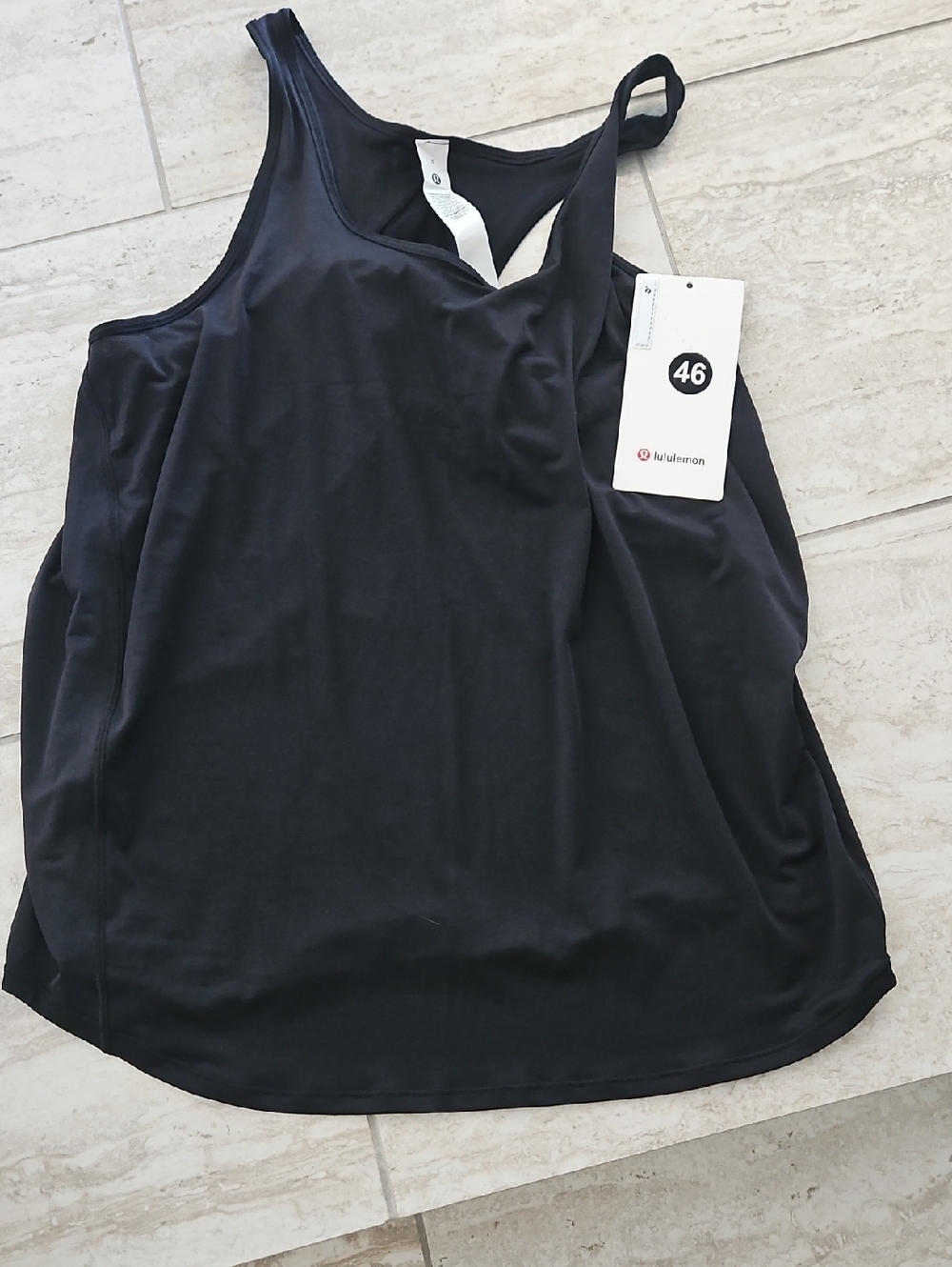 NWT. lululemon athletica Black Racerback Tank Top. Size 6